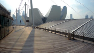 Marina Bay Sands Integrated Resort, Singapore, Bridges, Canopies, podium level 4, curved stainless steel railing with elliptical cut stanchions and curved tubular railing and cables, roof scape, roof scaping, value engineering, rationalising, large-scale multi billion dollar project, Sheldon Adelson, world-renowed architect Moshe Safdie, Safdie Architects, President's Design Award 2011, Siebrandus S. Wichers, archineering, envelope system design, facades, roofs, architectural steel structures, tapered mast with fin plates and macalloy bars, prefabrication, precast concrete planters and benches, access & maintenance, steel structure, fire intumescent paint, i-Light, countdown at Marina Bay, setting out recipe, geometry, freeform design, 3D model, mockup, detailed system design, steel engineering, BIM, shop drawing, tender documentation, rendered view, Maya, Rhinoceros, Grasshopper, AutoCAD, Revit, Excel.